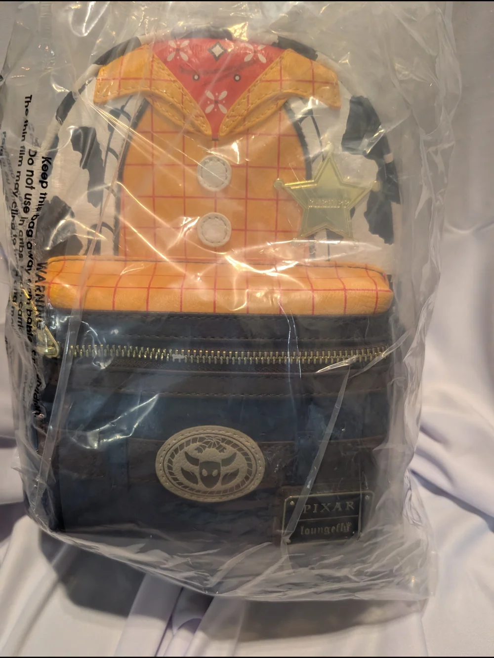 Loungefly Woody-Inspired Mini Backpack in Black, Yellow & Orange